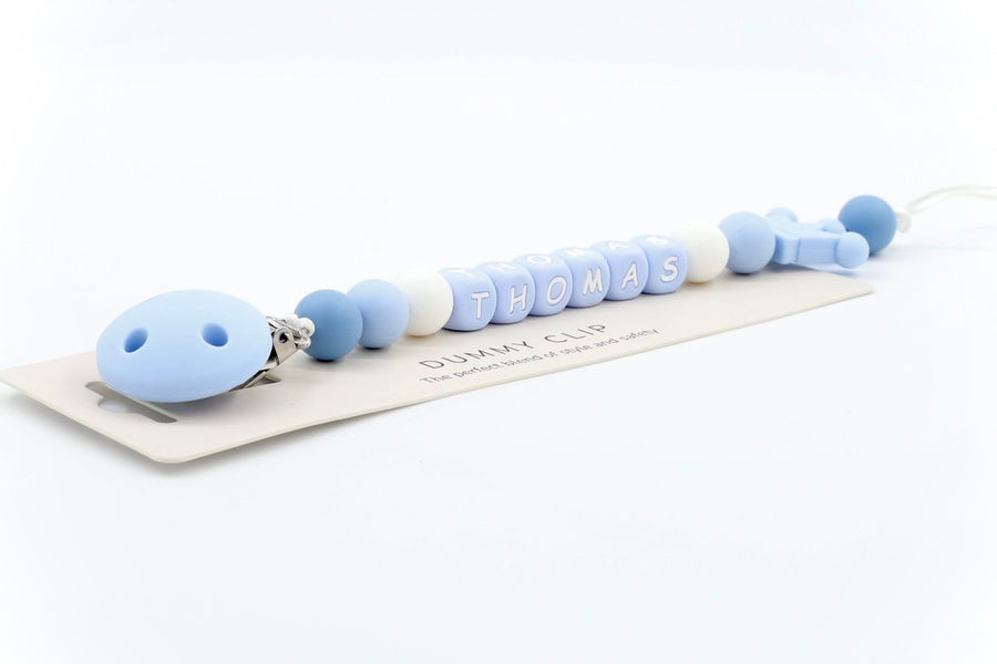 Mono-Crown dummy clip in soft blue and white silicone beads, personalised with name THOMAS