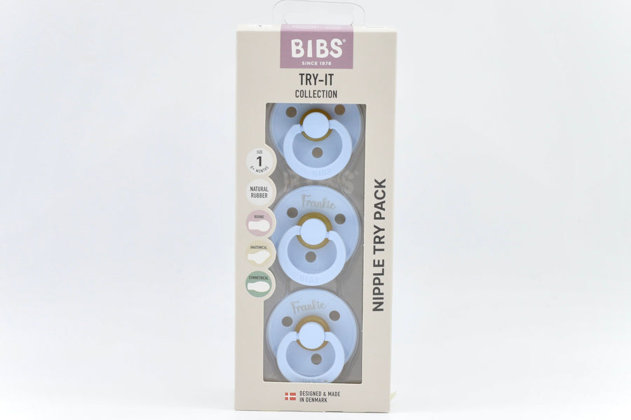 Personalised BIBS Try-It Collection in baby blue with name Frankie, featuring three natural rubber pacifiers in assorted nipple styles, size 1 for 0+ months