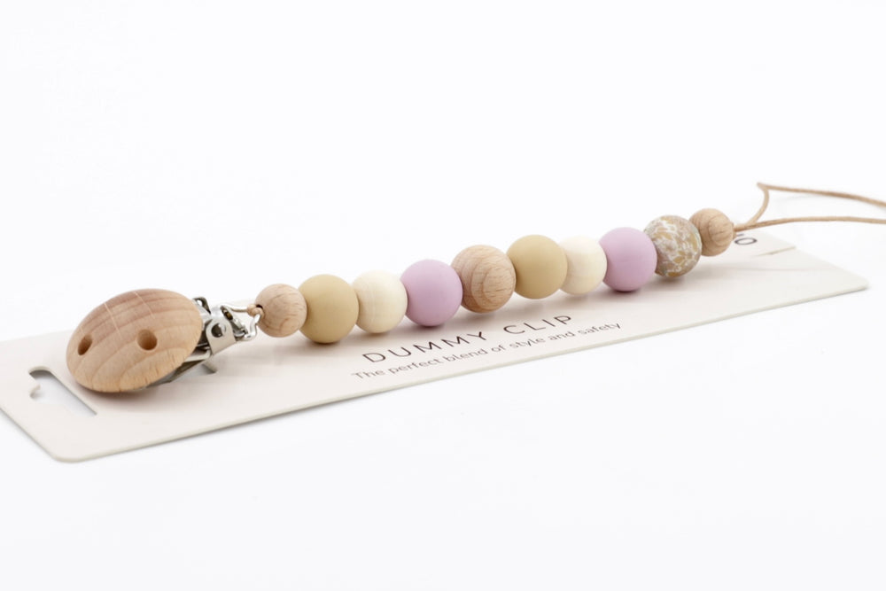 Velvet Sands Dummy Chain in soft lilac and neutral tones, featuring a mix of silicone and wooden beads with a natural wood clip, displayed on branded card.