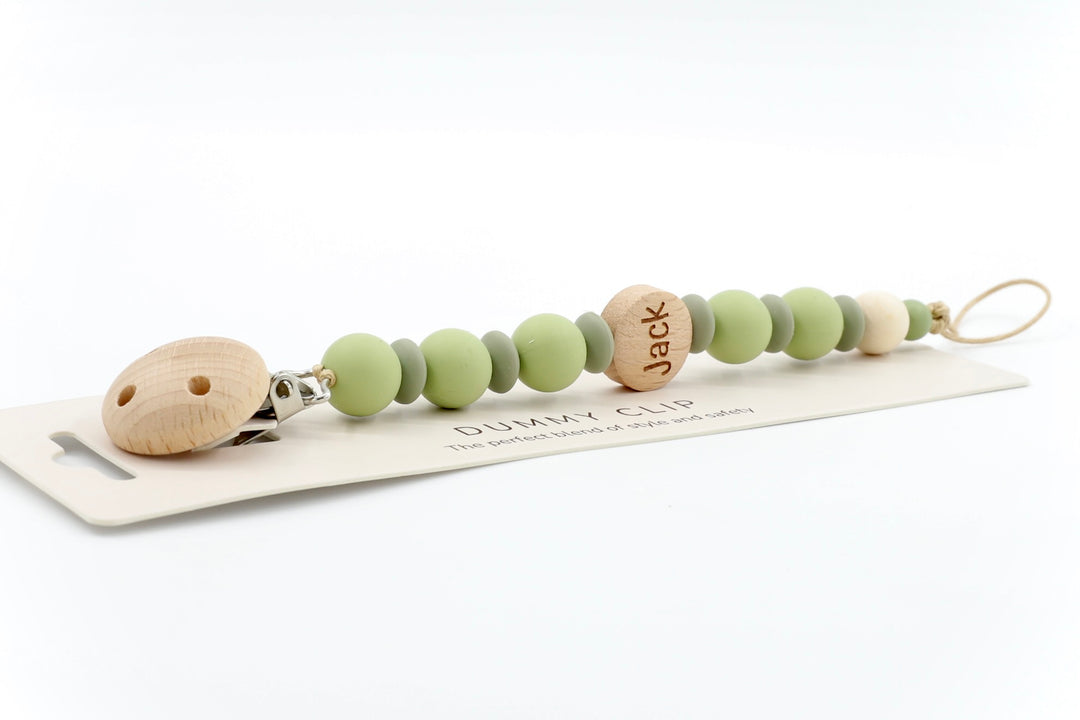 Soft sage & eucalyptus personalised dummy clip with engraved ‘Jack’ wooden bead and BPA-free silicone beads, baby-safe and stylish.